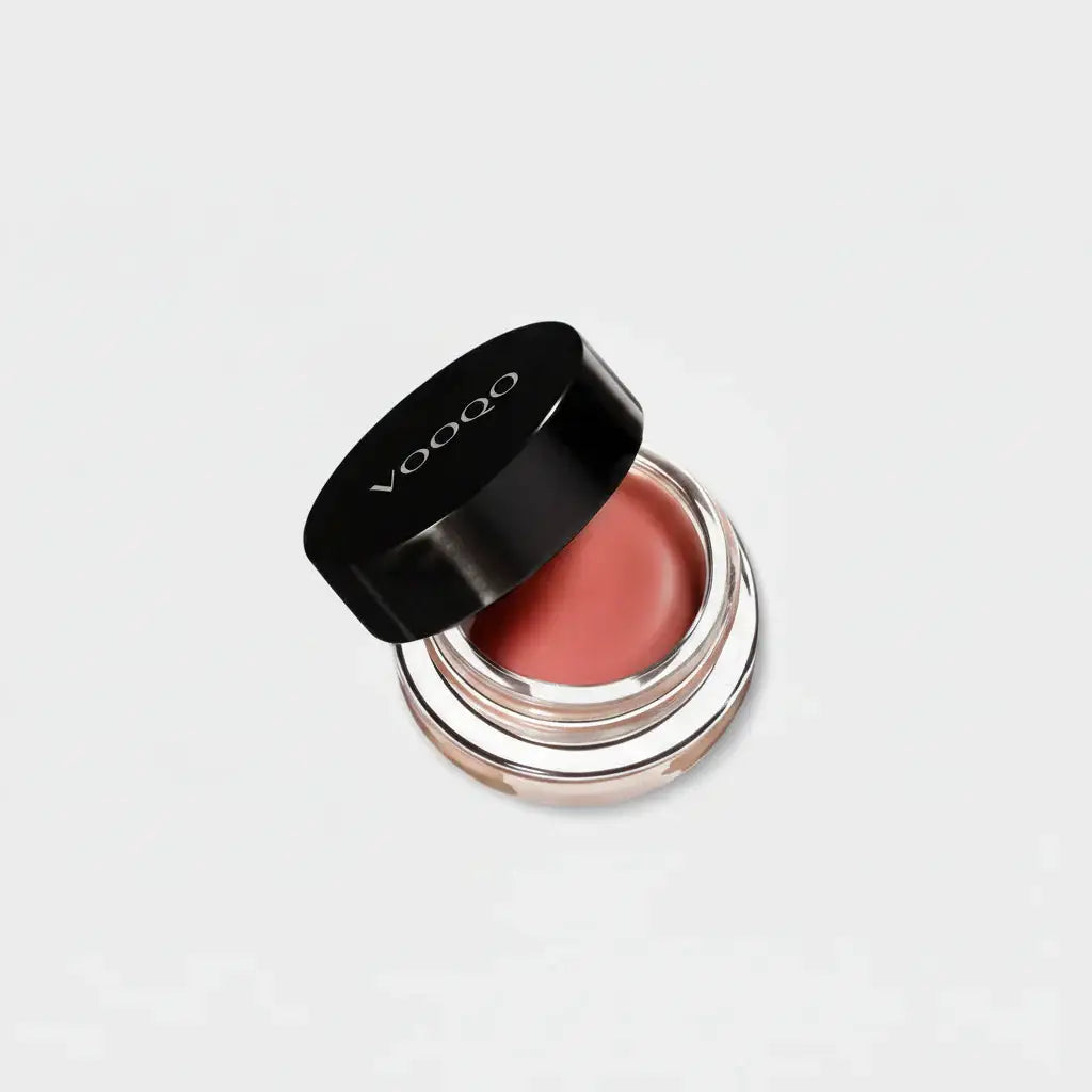 Voodoo cream blush in peachy nude shade in a sleek black and silver compact perfect for a natural glow