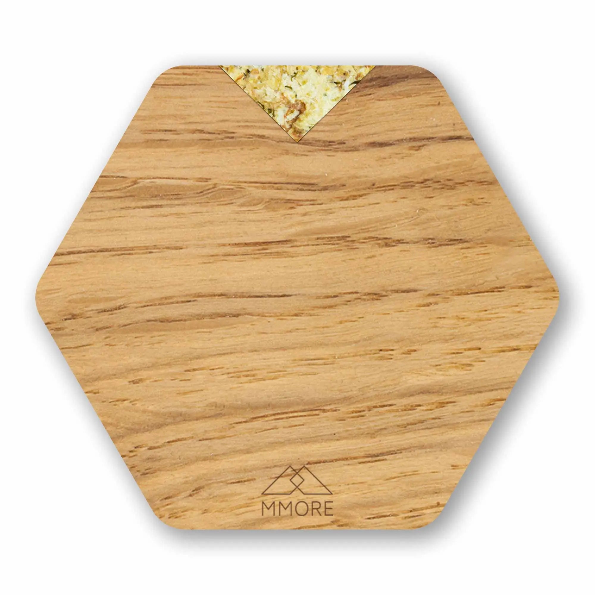 Personalized hexagonal wooden coasters in oak with gold leaf accent and engraved mmore logo at the centre of the set