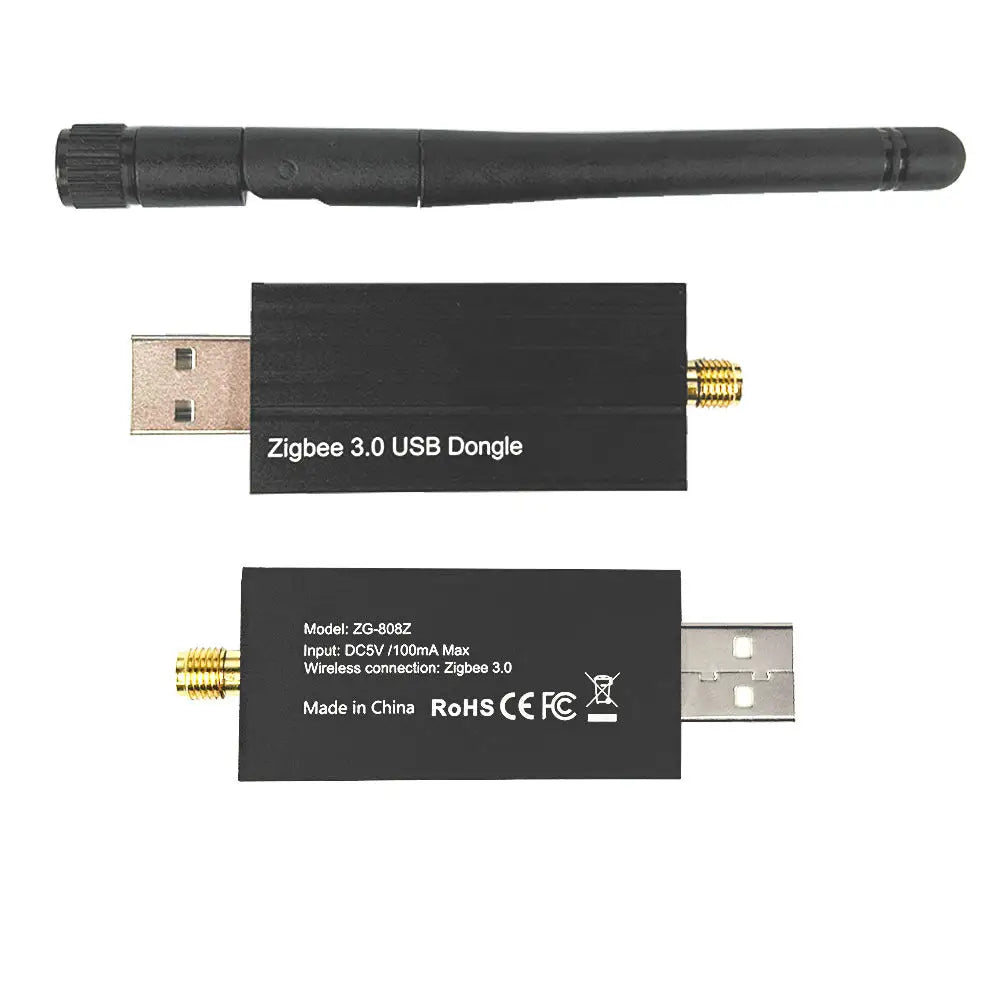 Black vu-tek zg-808z zigbee bridge usb dongle with gold antenna connector and printed specs on its surface